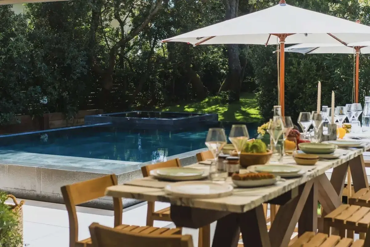 Table set by the pool of a private villa