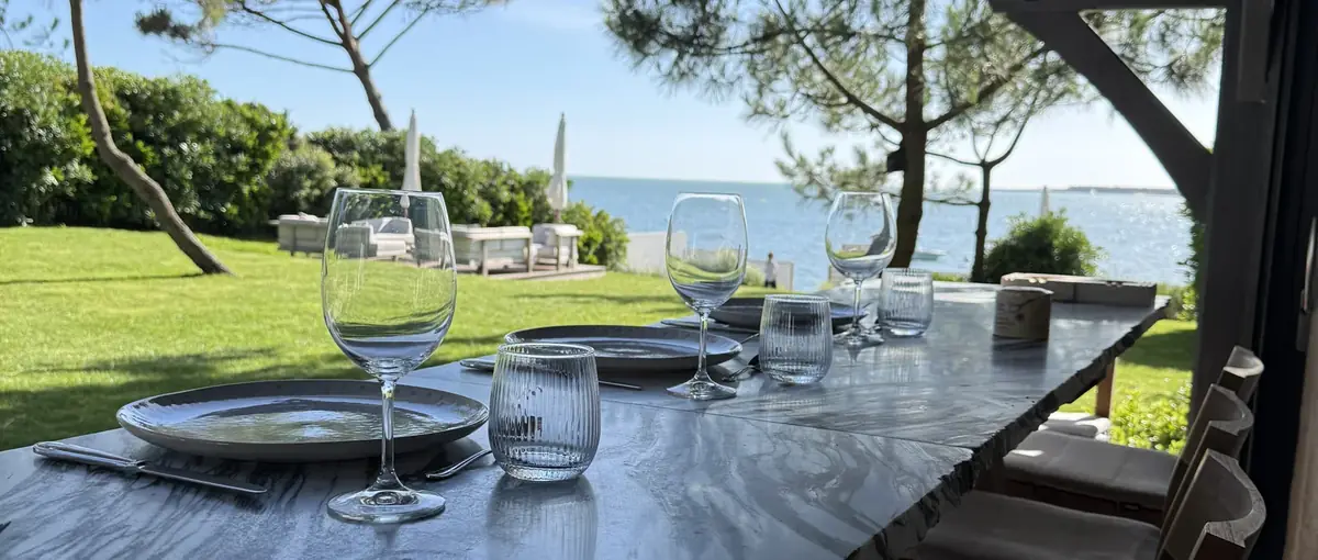 Table set facing Arcachon Bay for a private dinner