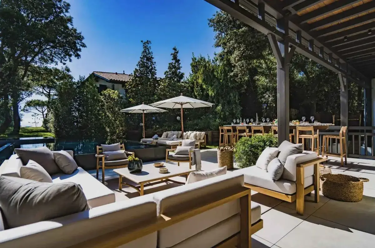 Summer terrace of a villa with an outdoor lounge