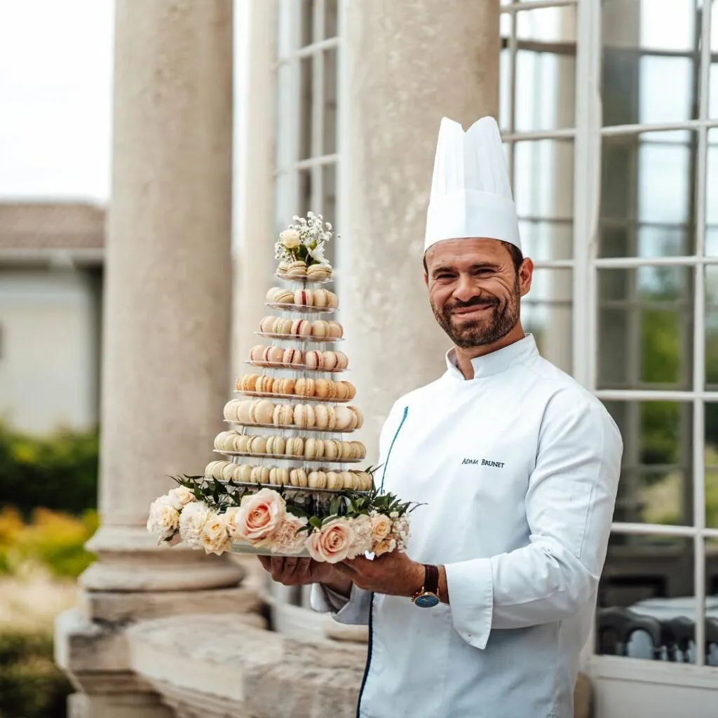 Chef Adam Brunet presenting a wedding tower